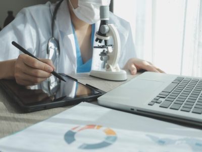 imgi_146_young-scientists-conducting-research-investigations-medical-laboratory-researcher-foreground-is-using-microscope_265022-55637